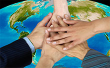 Hands clapsed on the world image