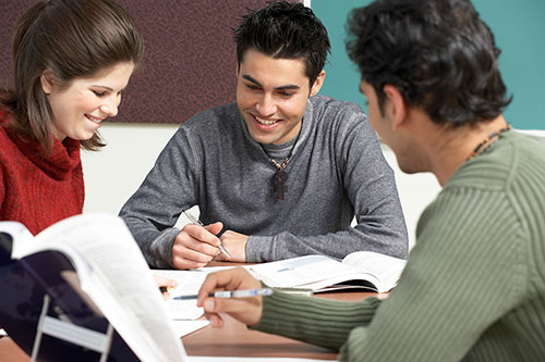 Students sitting around a table