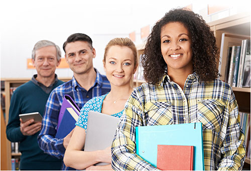 Students Standing in a library