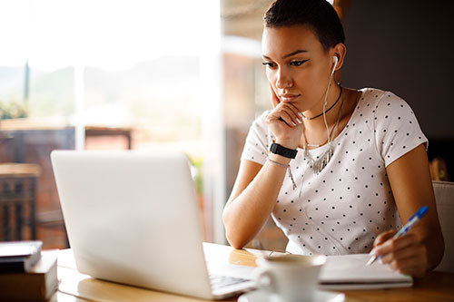 Student looking at a computer 