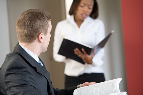 2 people in a business environment