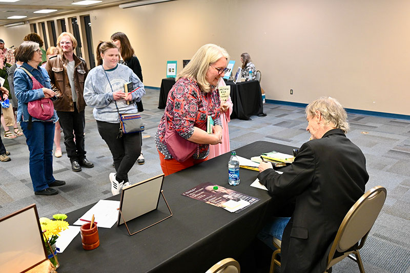 Ron Rash signing books